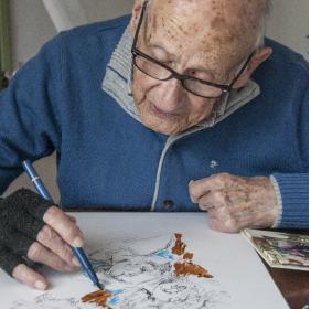 Giorgio Michetti mentre sta disegnando